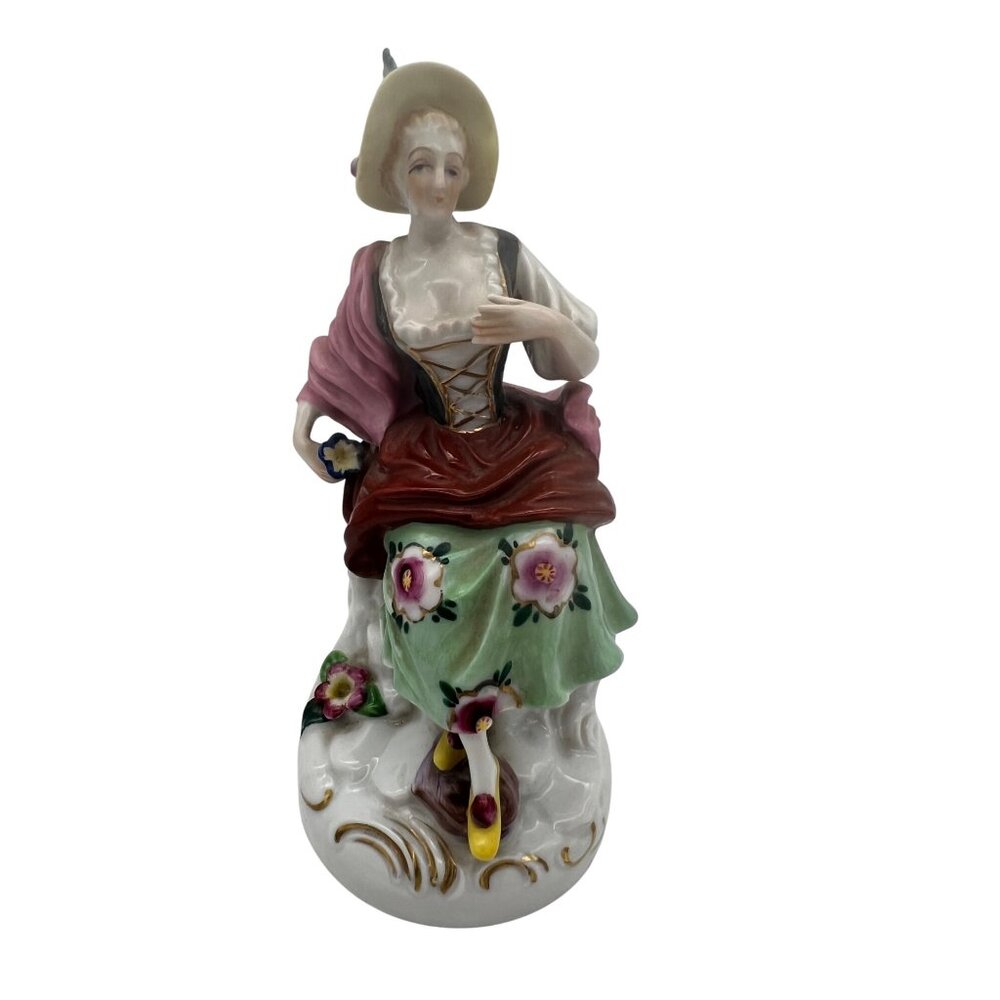 Vintage Porcelain Lady Figurine Wearing Floral Dress Sitting on Stump 6.25"